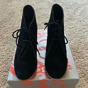 Kelsi Dagger “Fanetta” black suede wedge boots.